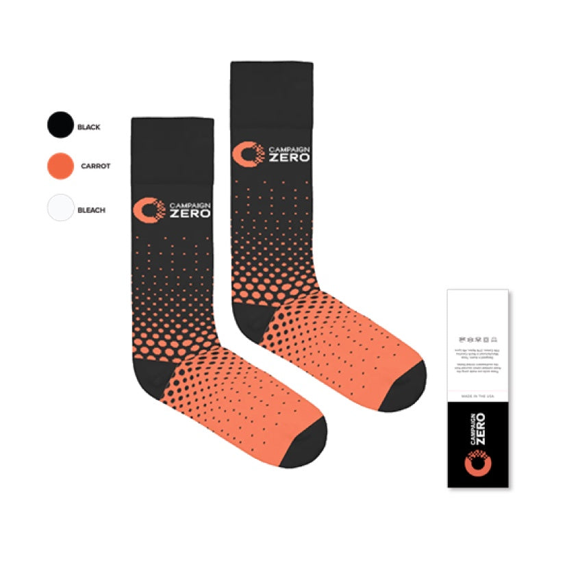 A pair of Campaign Zero Special Edition socks with a logo.